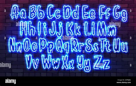 Neon futuristic hand font. Luminous tube alphabet uppercase lowercase letters on a dark brick ...