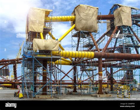 Oil rig platform during construction site in the harbor yard and ...