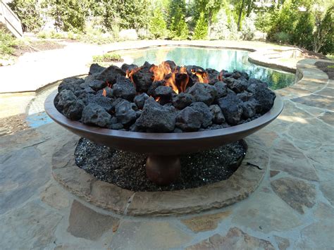 60" Barbados fire bowl with large black lava rock. Available in electronic or manual ignition ...