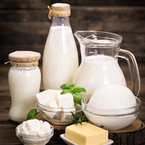 Fresh dairy products on the wooden table - ET Transport