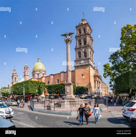 Celaya, Guanajuato, Mexico - November 24, 2019: Tourists and locals around the Immaculate ...