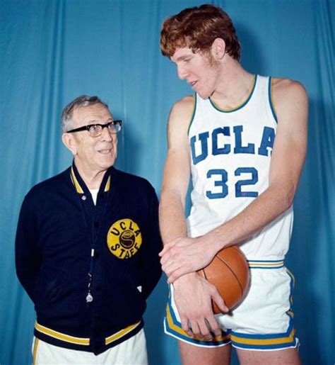 UCLA basketball coach John Wooden poses with player Bill Walton in this 1971 photo. Walton won ...