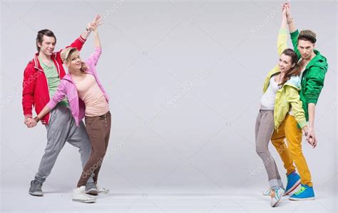 Two hip-hop couples dance and smile — Stock Photo © konradbak #22267941