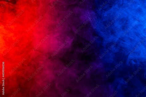 Fog in red blue neon light on black background. Stock Photo | Adobe Stock