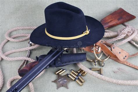 Wild West Rifle, Ammunition and Sheriff Badge Editorial Image - Image of shooter, star: 122456660