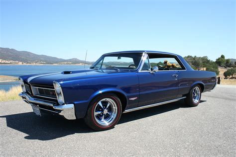 Beautiful blue 1965 Pontiac GTO with my favorite GTO wheels