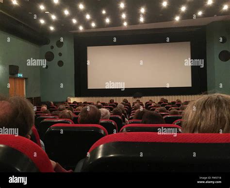 People inside a cinema waiting for the movie to start Stock Photo - Alamy