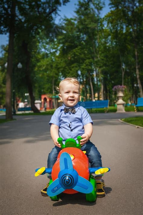 Happy Baby Driving Toy Car Outdoors Stock Image - Image of care ...