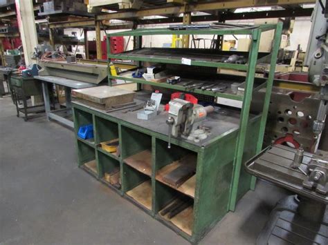 Machines Used | Steel Work Bench with Upper Shelves and Bench Vise