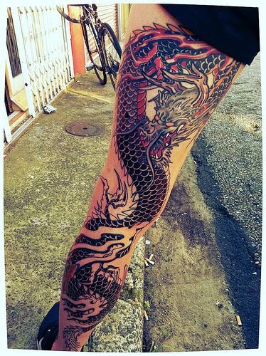 Dragon Tattoo Over The Leg | Best tattoo design ideas