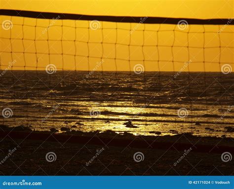 Beach Volleyball and Sunset Stock Photo - Image of water, sunset: 42171024