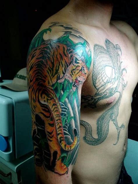 top tattoo designs: Chest Dragon Tattoo