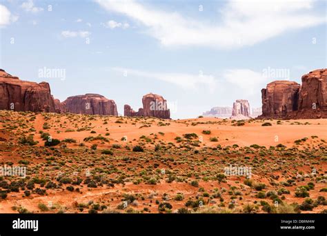 Monument Valley mesa on the red and arid Colorado Plateau desert, straddling the Arizona-Utah ...