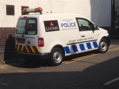 A private security van marked to fool people into thinking it's a police vehicle (UK). Legal ...