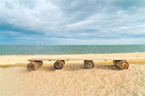 wood bench on beach with sea beach background 3446441 Stock Photo at Vecteezy