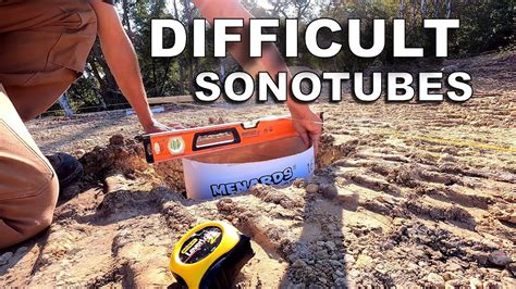 Placing 9 Sonotube Concrete Forms in Very Sloppy Holes [and Bedrock ...