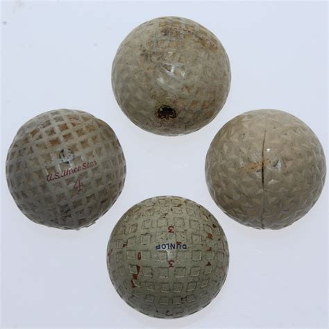 Lot Detail - Four Classic Golf Balls - US Three Star, Dunlop England ...