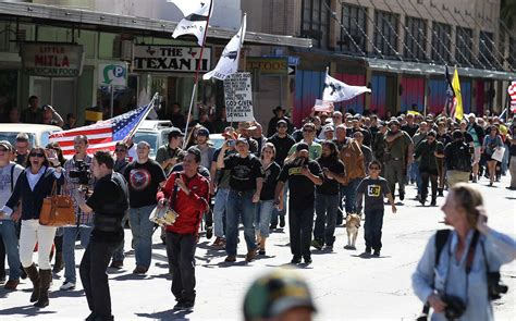 Open-carry protestors rally at police substation