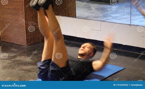 Handsome Young Man Doing Abs Exercises on Mat Stock Footage - Video of lifestyle, adult: 131029422