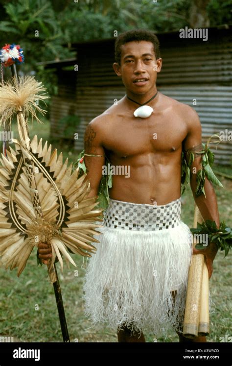 A young Fijian is dressed in traditional costume at Waiyevo on the ...