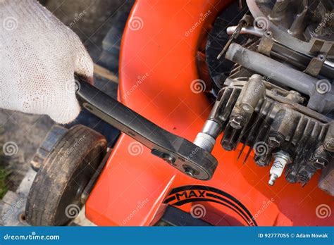 Repairing a lawn mower stock image. Image of bonnet, motor - 92777055