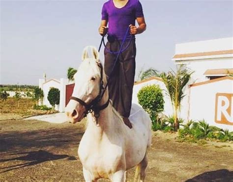 Ravindra Jadeja clicked while riding a horse