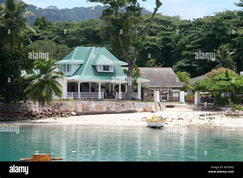 Tranquil tropical beach house in the Seychelles Stock Photo - Alamy