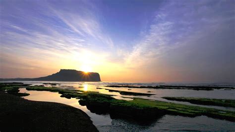 2-Day Jeju Island Tour to Folk Village, Cave & Sunrise Peak