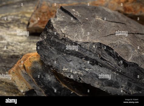 Raw Jet stone close up.Gemstone used for jewelry Stock Photo - Alamy