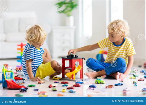 Kids Play with Toy Cars. Children Playing Car Toys Stock Image - Image of living, family: 147217773