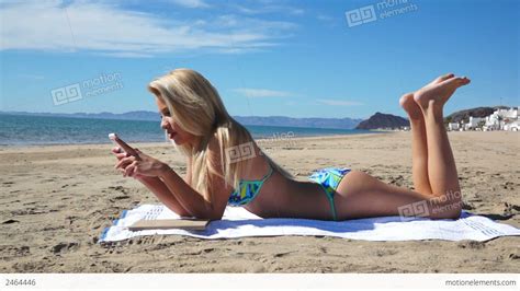 Beach Bikini Girl Lay Texting Stock video footage | 2464446