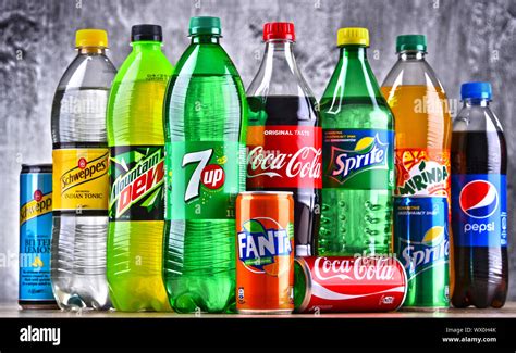 Bottles of global soft drink brands including products of Coca Cola ...