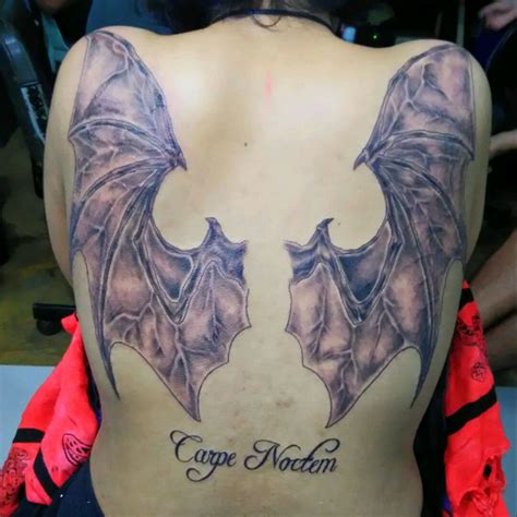 Top more than 71 bat wings back tattoo latest - in.eteachers