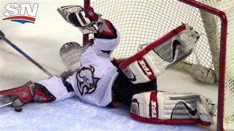 Dominik Hašek / Buffalo Sabres Goalie Dominik Hasek Pulls The Puck From ...