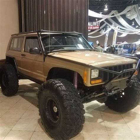 Tan Jeep Cherokee XJ in Showroom