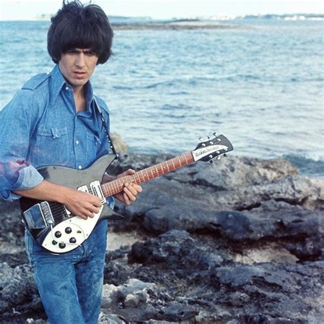 George Harrison playing John Lennon’s Rickenbacker (1965) : beatles