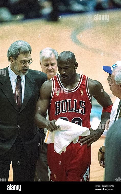 Michael Jordan with coach Phil Jackson during the 1997 NBA Finals against the Utah Jazz Stock ...