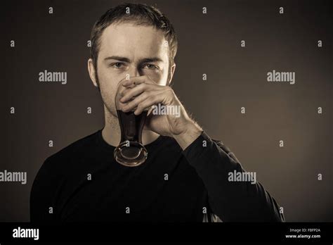 Man drinking beer Stock Photo - Alamy