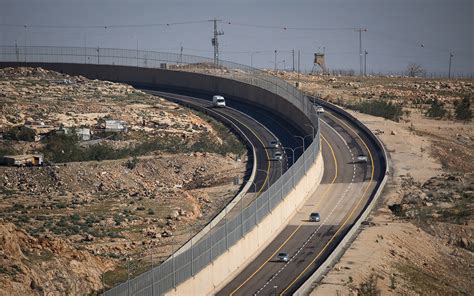 In first, Israel opens road with wall dividing Israeli and Palestinian traffic | The Times of Israel