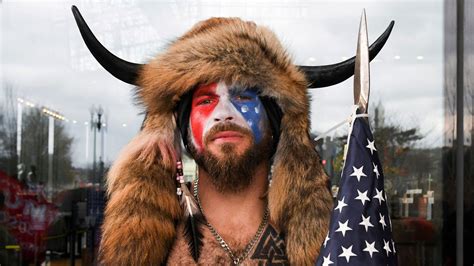 US Capitol riot: 'QAnon Shaman' jailed for 41 months over role in 6 ...