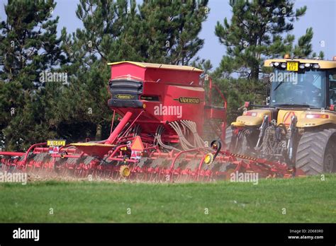 Modern large farm machinery preparing fields for new crop Stock Photo - Alamy