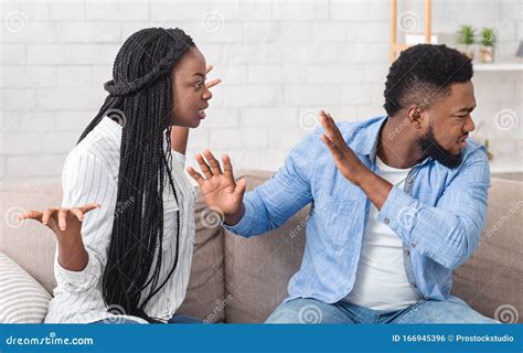 Black Millennial Couple Arguing on Sofa at Home Stock Photo - Image of husband, millennial ...