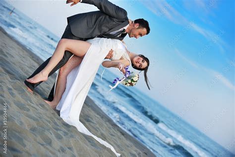 romantic beach wedding at sunset Stock Photo | Adobe Stock