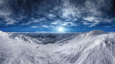 Download Incredible Snowy Tundra Mountains Wallpaper | Wallpapers.com