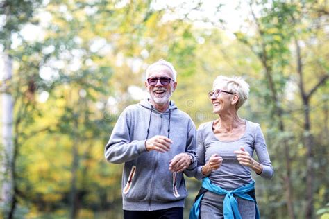 Old Couple in the Public Park Running Stock Photo - Image of lifestyle ...