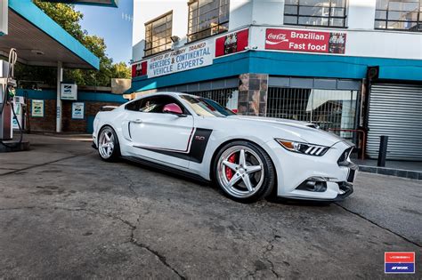 Classy 5 Spoke Rims Wrappped in Continental Tires Adorning White Ford Mustang 5.0 — CARiD.com ...