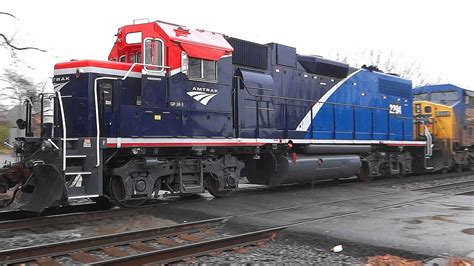 The 1st Amtrak EMD GP38-3 in the New Modern Phase VII (7) Paint Scheme - YouTube