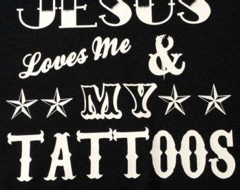 jesus loves me and my tattoos t - shirt in black with white lettering ...