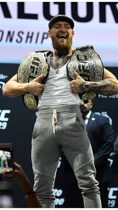 Conor McGregor with Wrestling Belts