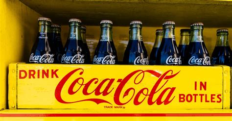 Coca-cola Bottles in Yellow Crate · Free Stock Photo